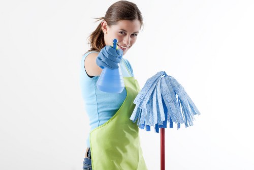 Steam carpet cleaning service in St Giles removing dirt from a living room carpet