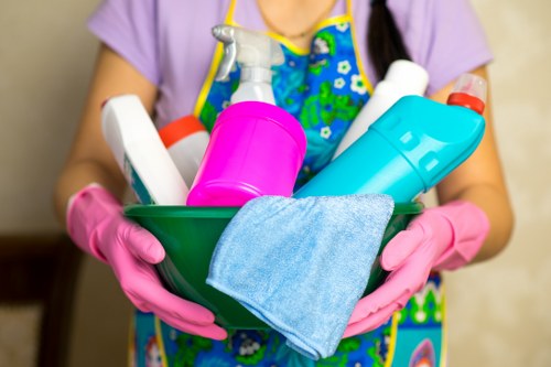 Cleaner using protective equipment during carpet cleaning